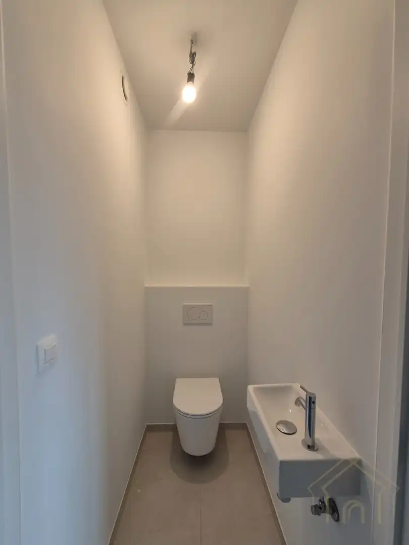 Nieuwbouwappartement met 2 slaapkamers en garage foto 7