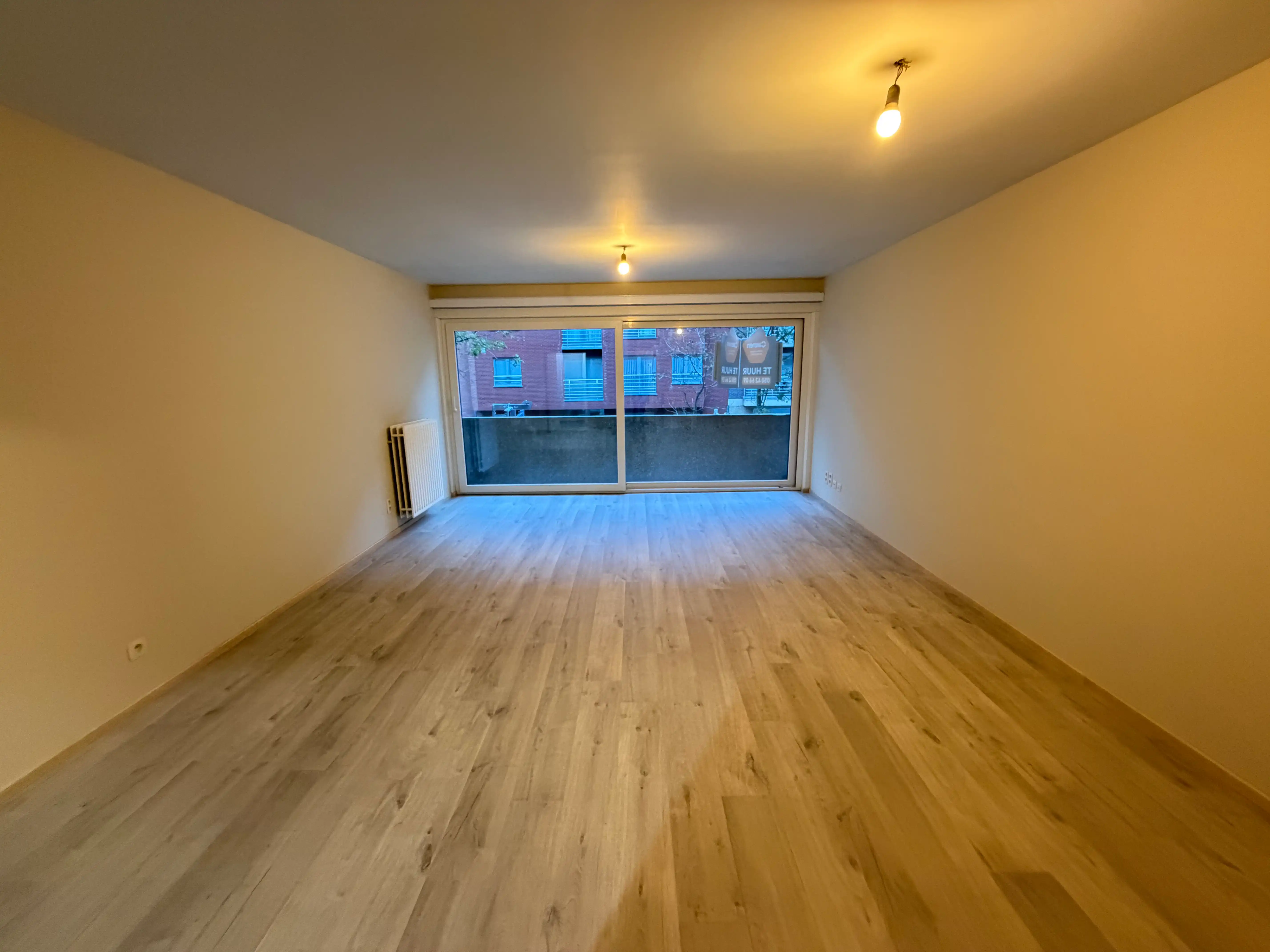 Stijlvol tweeslaapkamerappartement te huur in Blankenberge met staanplaats. foto {{pictureIndex}}