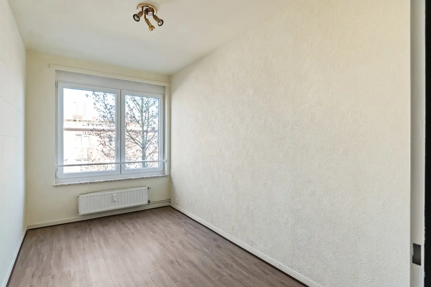 Lichtrijk appartement met 2 slaapkamers en ondergrondse parkeerplaats foto 4