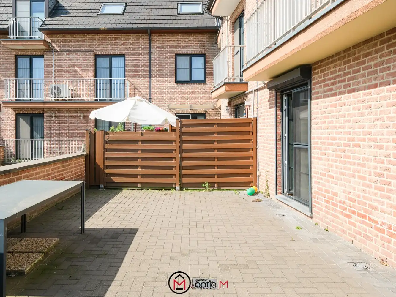 Gelijkvloers appartement te koop in Bilzen – Ruim wonen met terras, carport en kelderberging foto 19