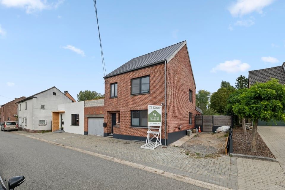 Hoofdfoto van de publicatie: TE RENOVEREN GEZINSWONING MET GARAGE GARAGE IN VLIERMAAL