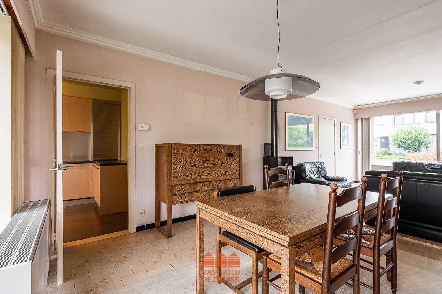 Lichtrijke halfopen bebouwing met 3 slaapkamers en garage foto 6