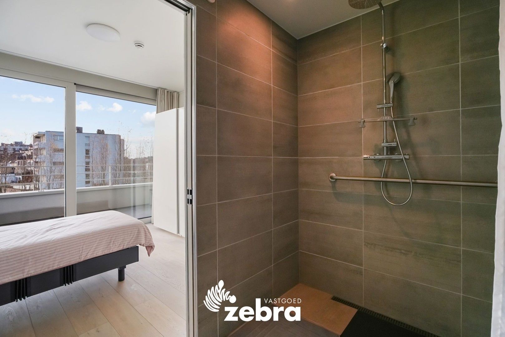 Moderne serviceflat met prachtig zicht op de Leie en autostaanplaats te Deinze! foto 19