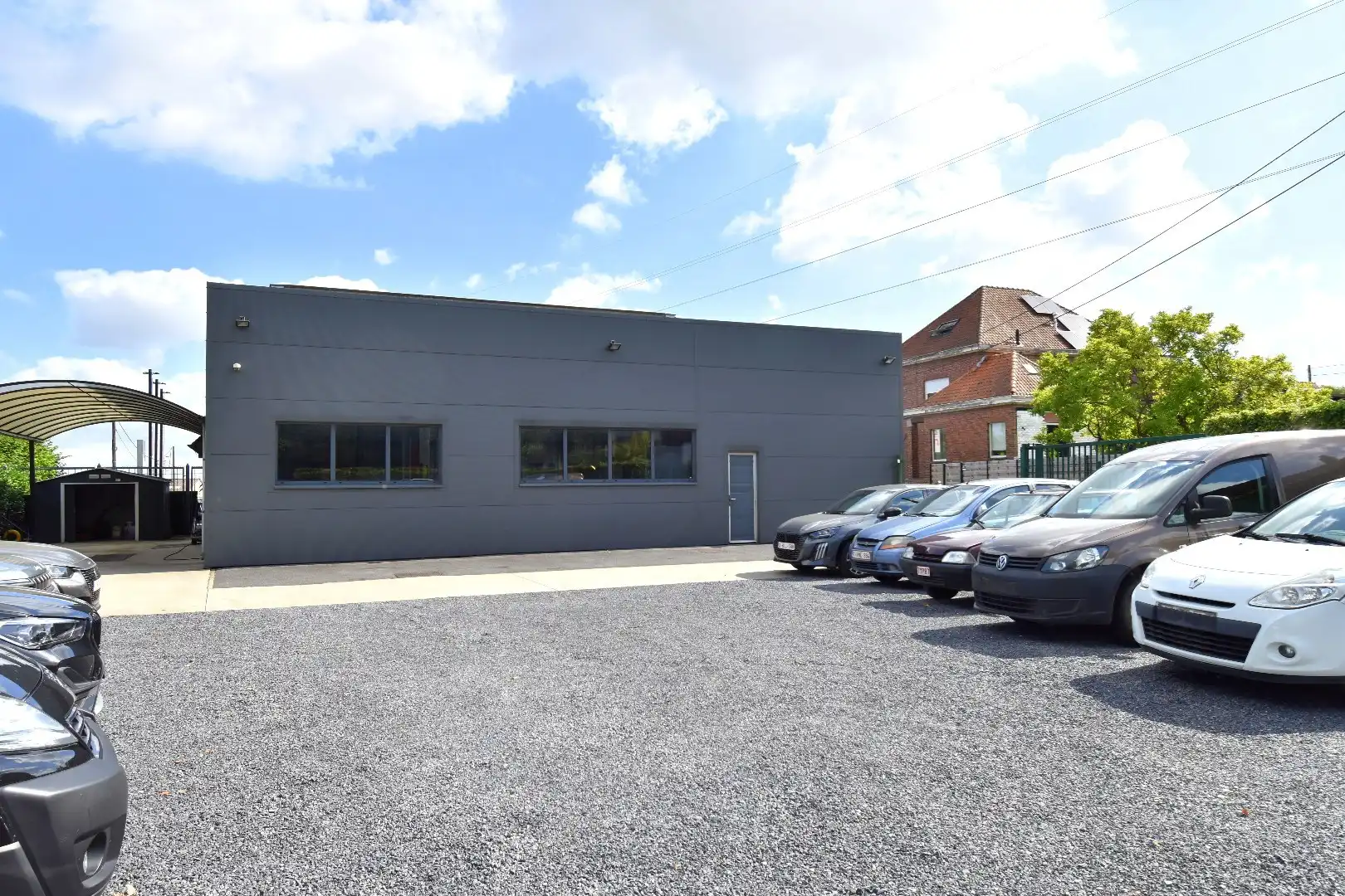 Commercieel pand met showroom, atelier, parking én bovenliggend appartement te koop in Bellegem foto 17