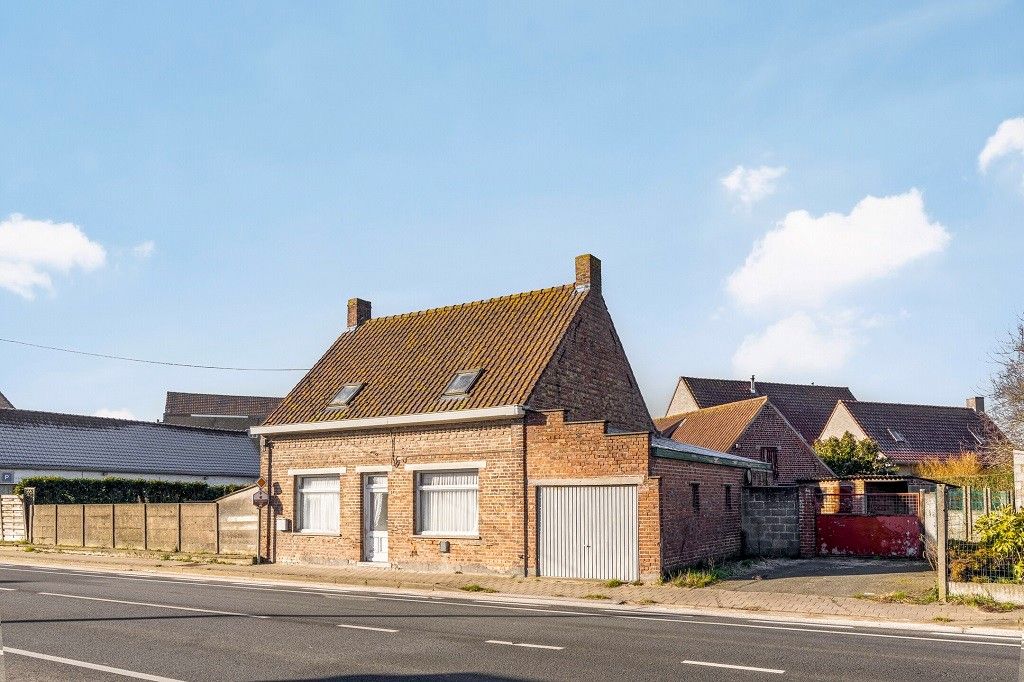 MERKEM: Zonnig maar te renoveren woonhuis met 3 slaapkamers, te vernieuwen comfort, garage, diverse koterijen en tuin op 618m² grondopp. foto 3