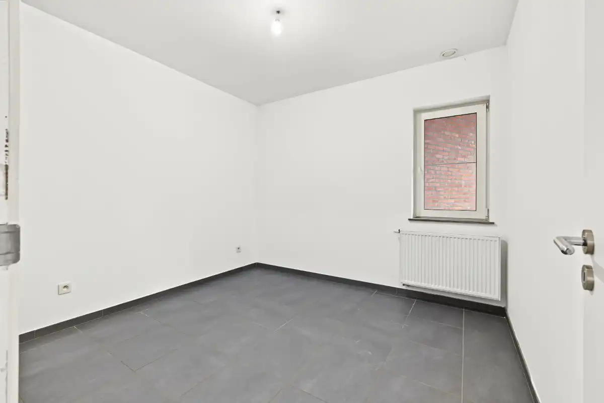 Volledig gerenoveerd gelijkvloers appartement met privatief terras in het hart van Kruibeke foto 16