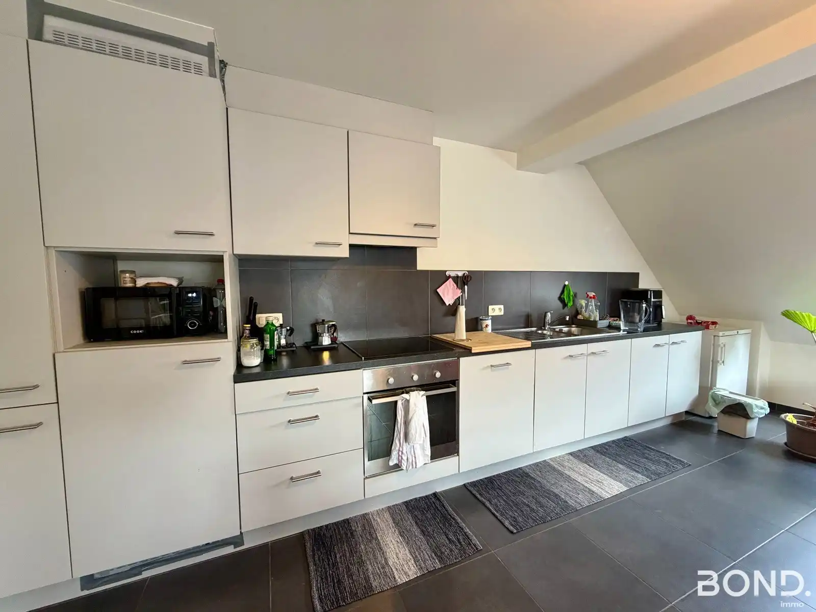 Vernieuwd appartement met 1 slaapkamer in hartje Leuven! foto 5