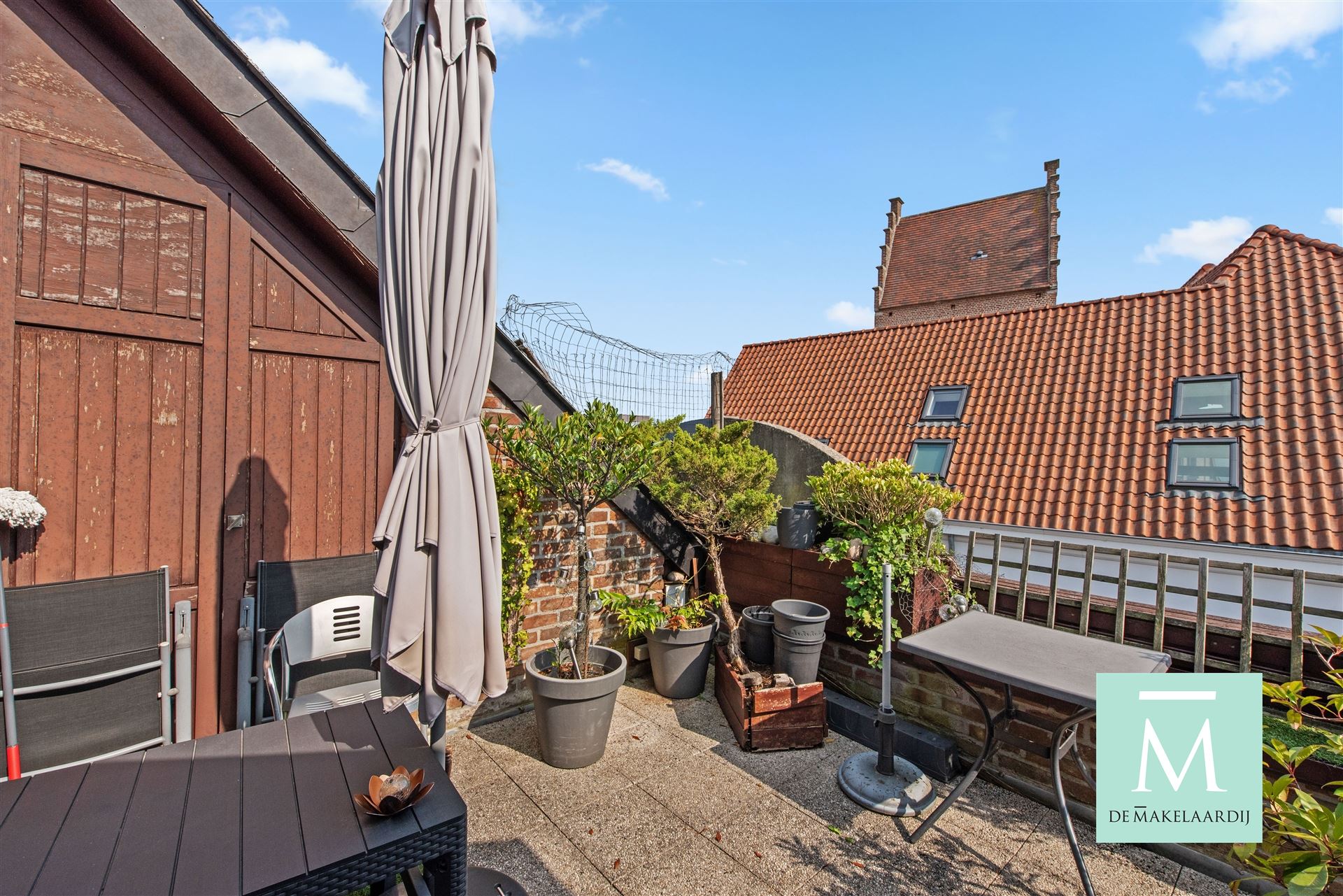 Uiterst centraal gelegen appartement op hoogste verdieping met terras foto 12