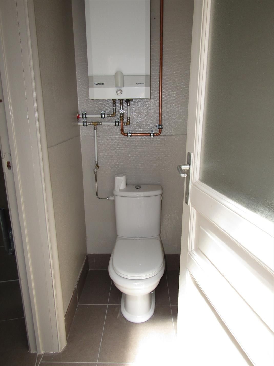 Stadswoning met 3 slpk en tuintje te koop op zeer goede locatiein Kortrijk. foto 14
