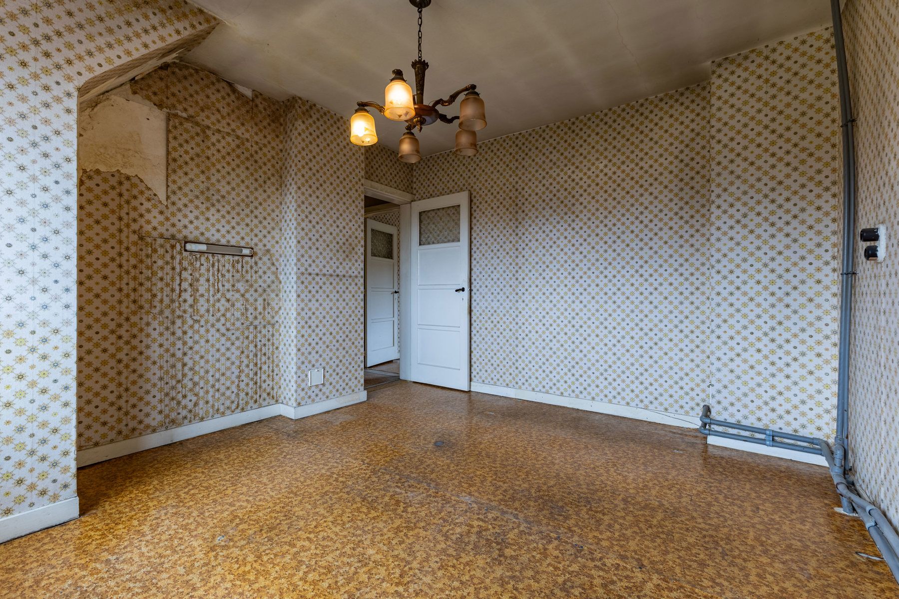 Gunstig gelegen te renoveren driegevelwoning foto 18