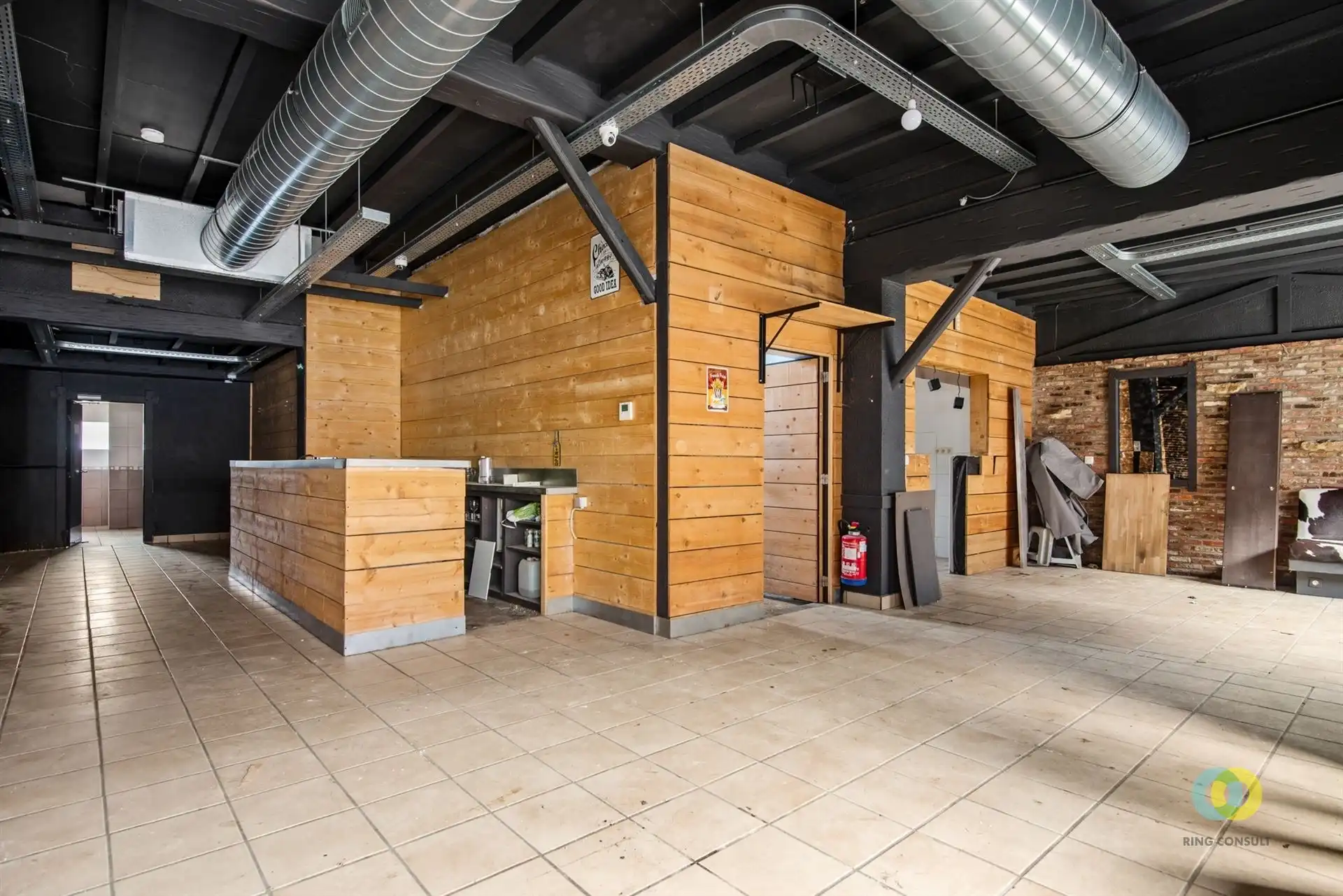 Handelshuis met bovenliggend duplexappartement foto 6