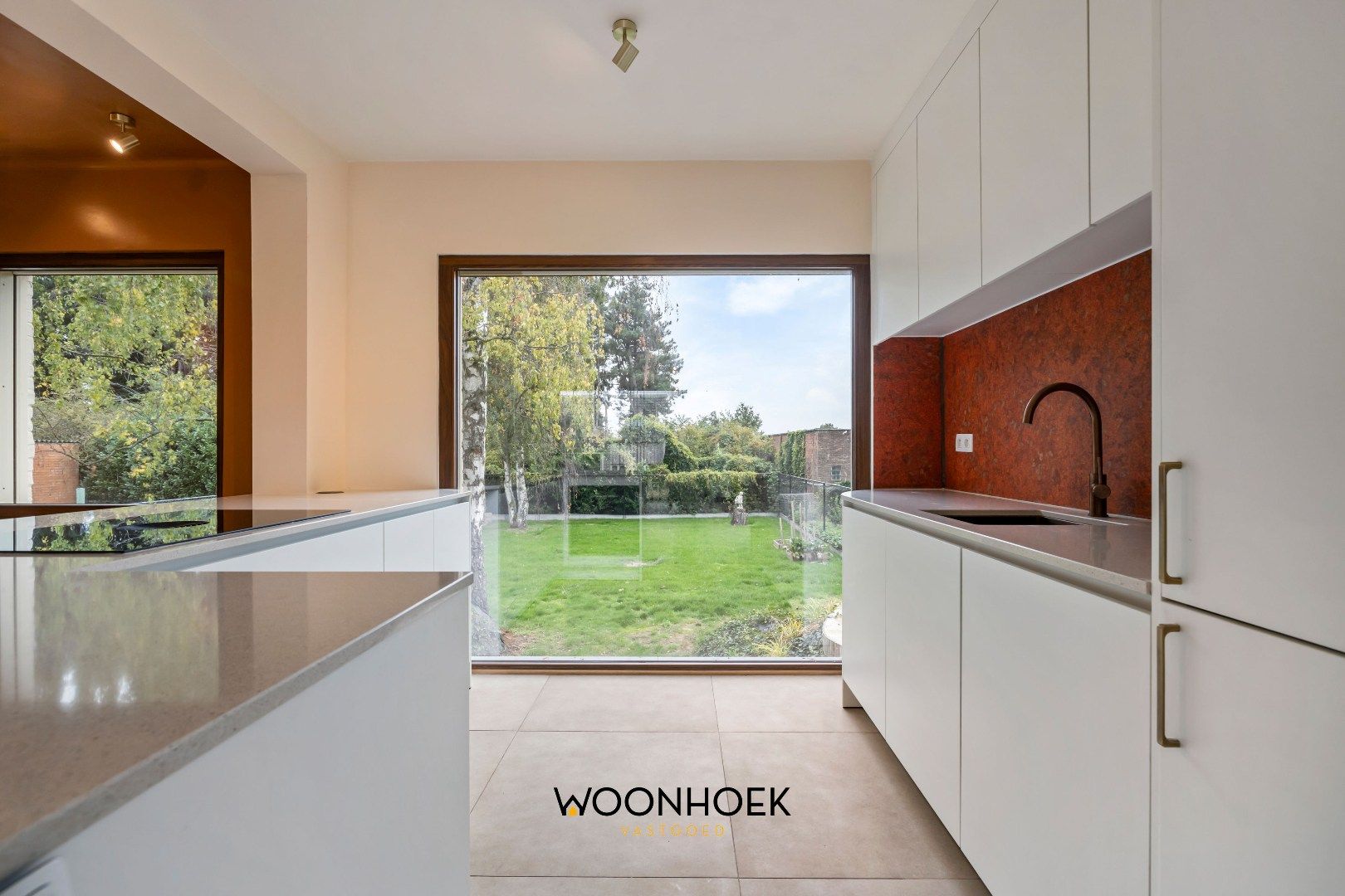 Uitstekend gelegen OB met inpandige garage en grote tuin in Moerbeke! foto 5