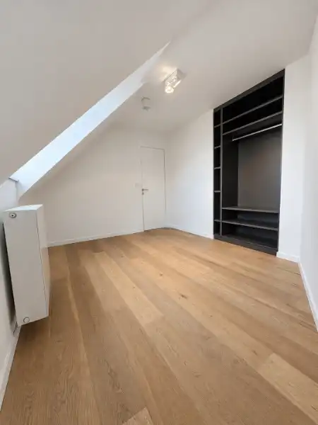 Stijlvol dakappartement met terras en veel privacy in het centrum van Geel foto 13