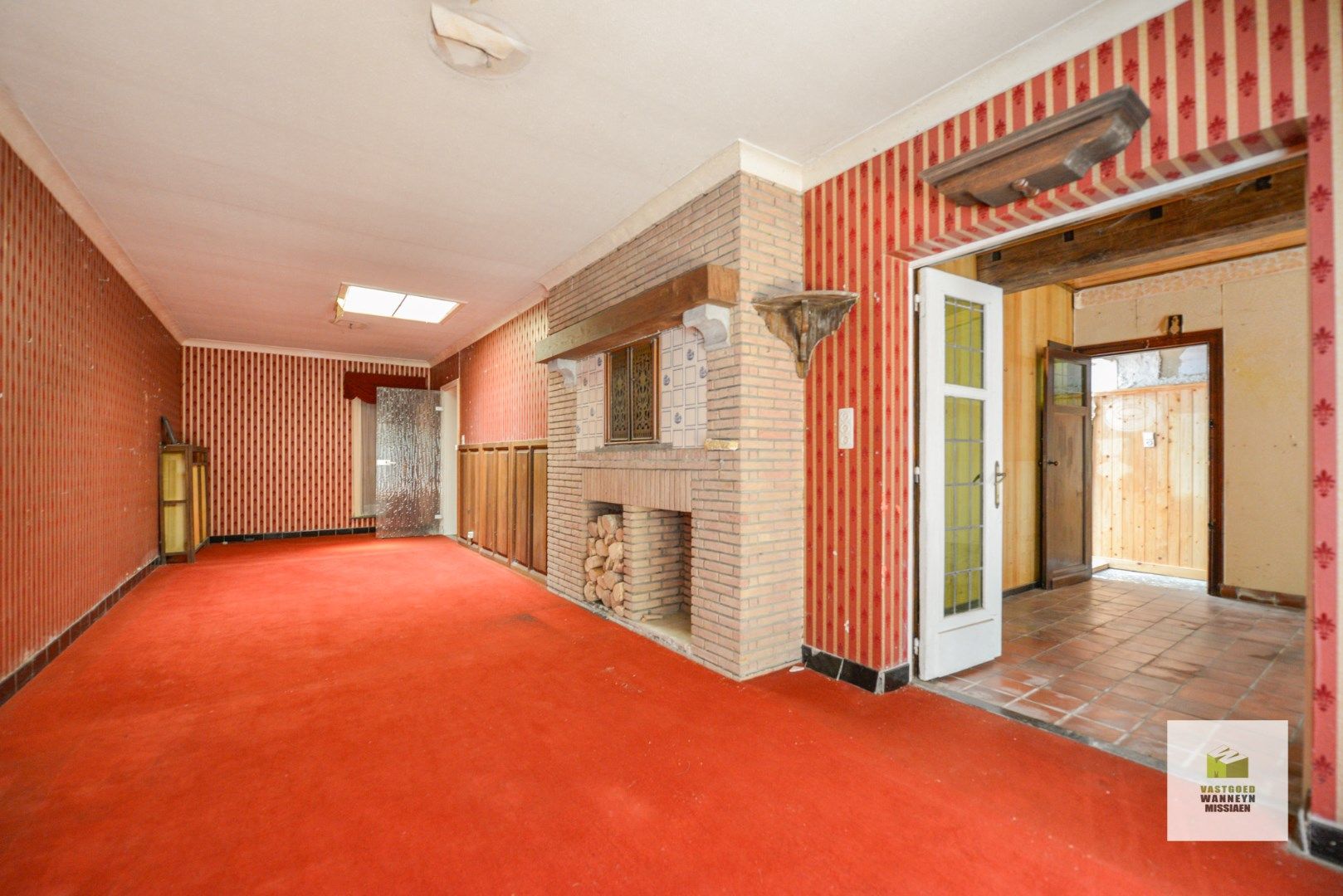 Karaktervolle, te renoveren woning met 3 slaapkamers, diepe tuin, garage met uitweg. foto 4