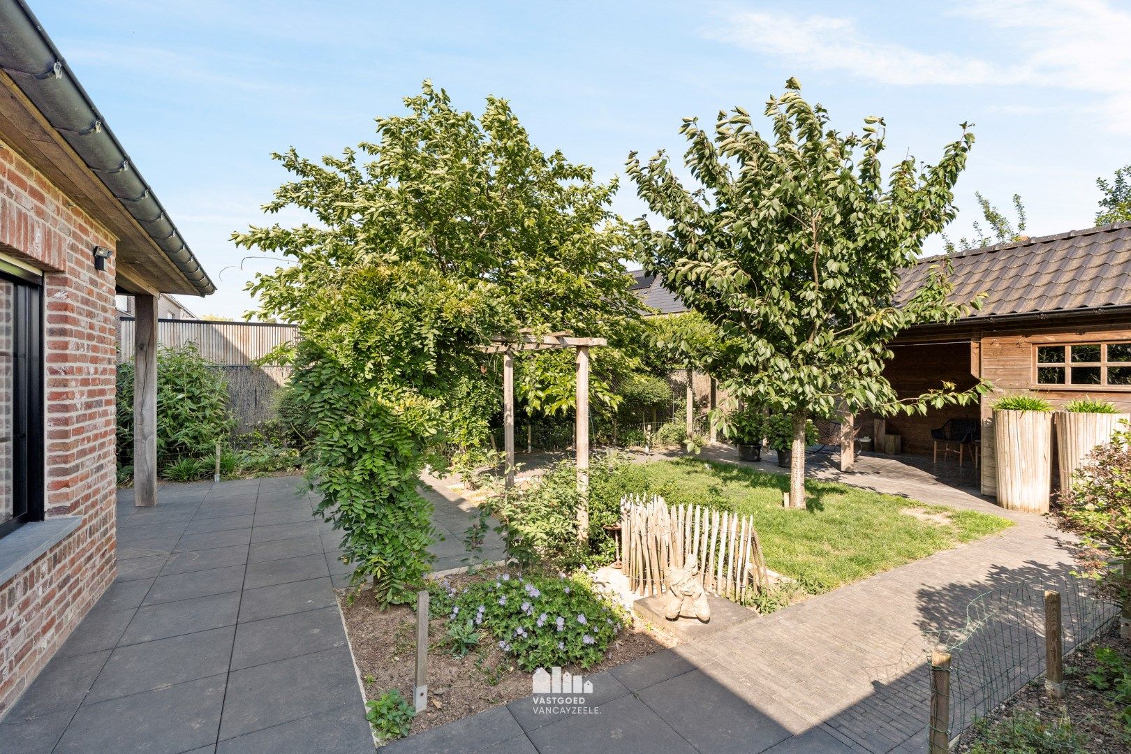 Recente kwalitatief afgewerkte woning met zonnige tuin en garage. foto 23