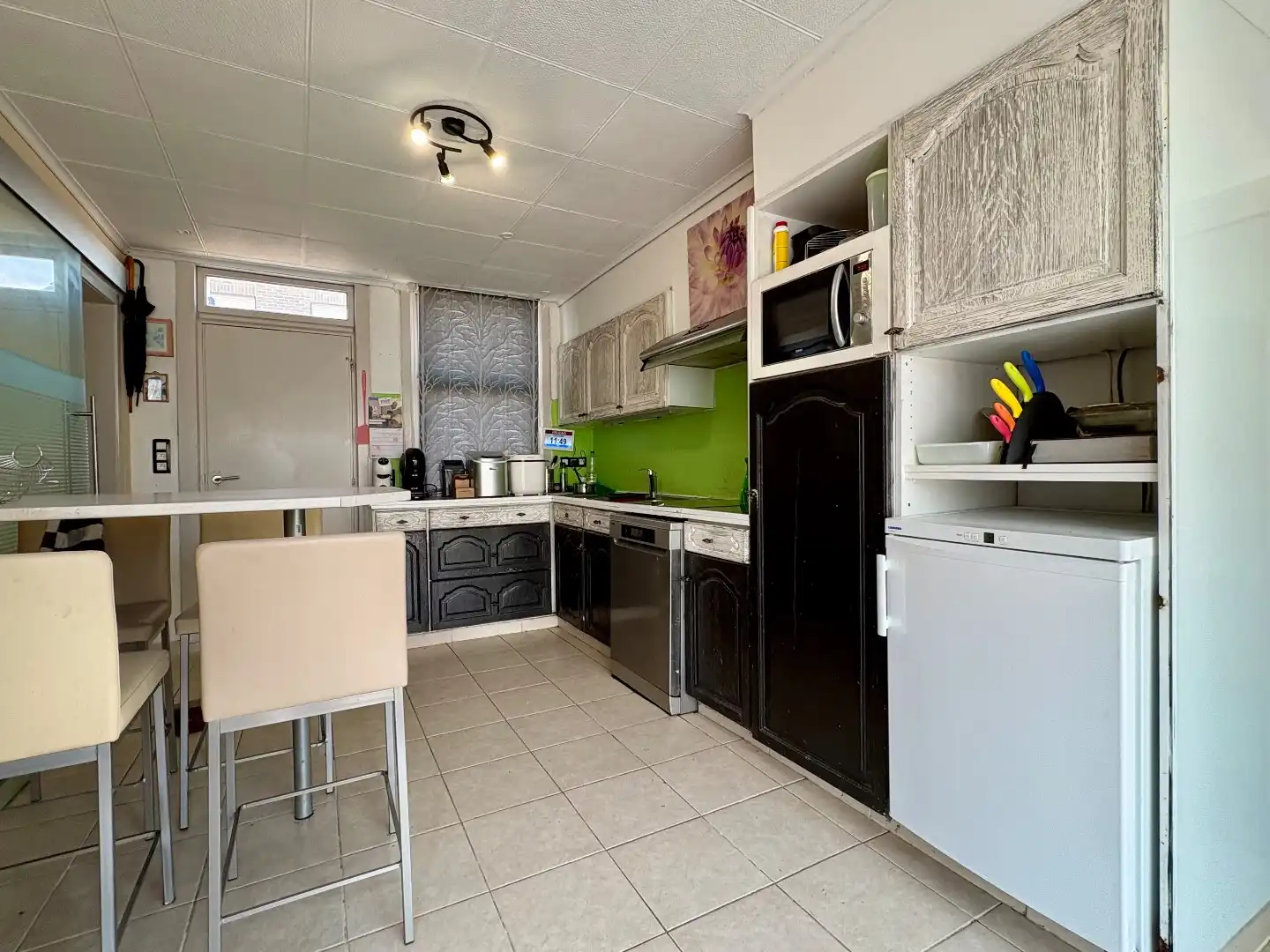 Woning te koop in het landelijke Tiegem met veel potentieel foto 7