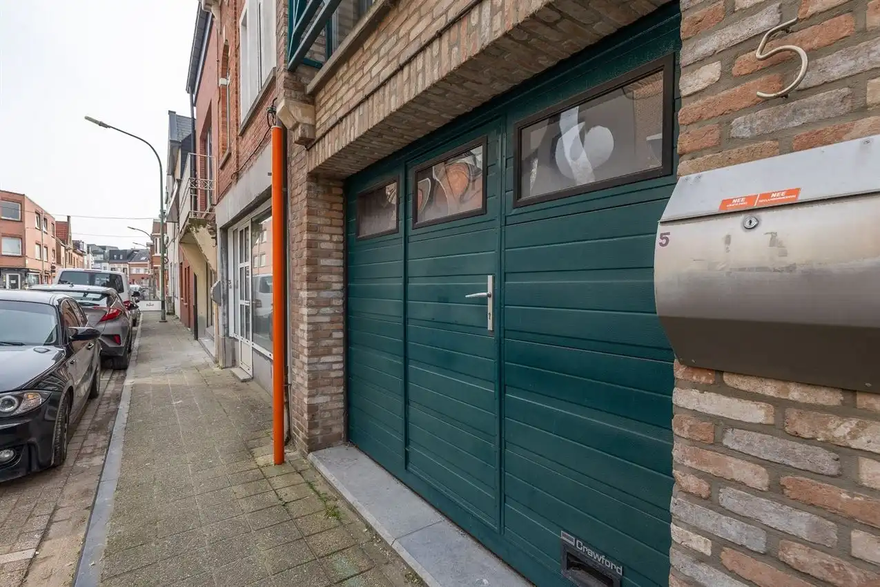 Verzorgde stadswoning met inpandige garage foto 24