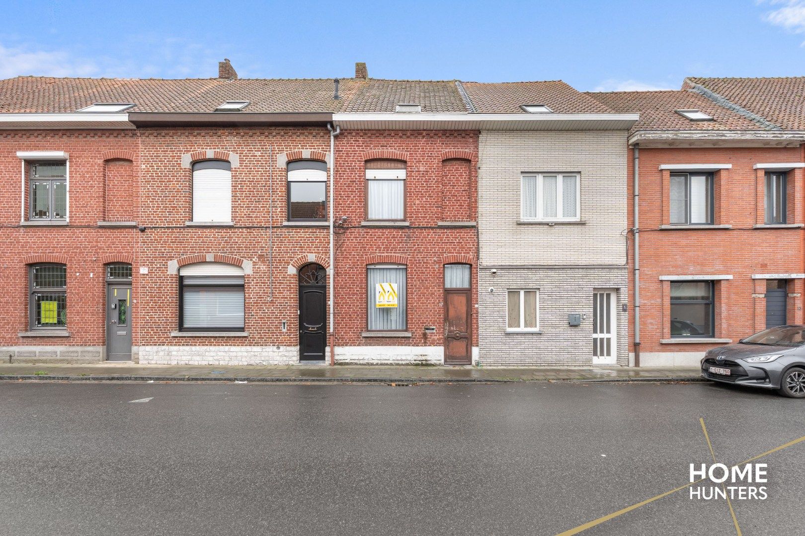 Charmante te renoveren rijwoning met 3 slaapkamers en diepe tuin op centrale ligging in Menen foto 30