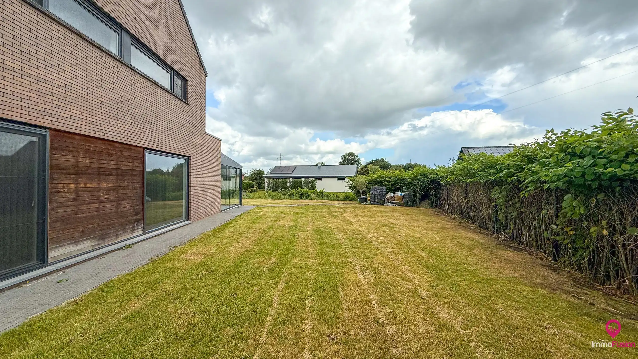Recente halfopen woning met 3slpks, veranda en ruime tuin! foto 36