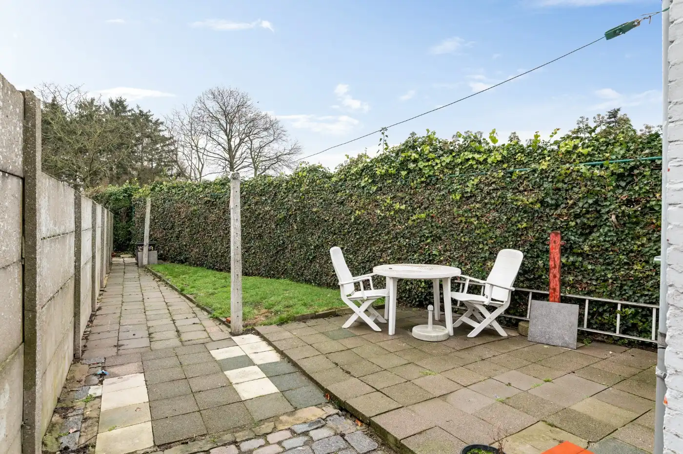 Leuke starterswoning met 2 slpk., garage en gezellig west-tuintje foto 23