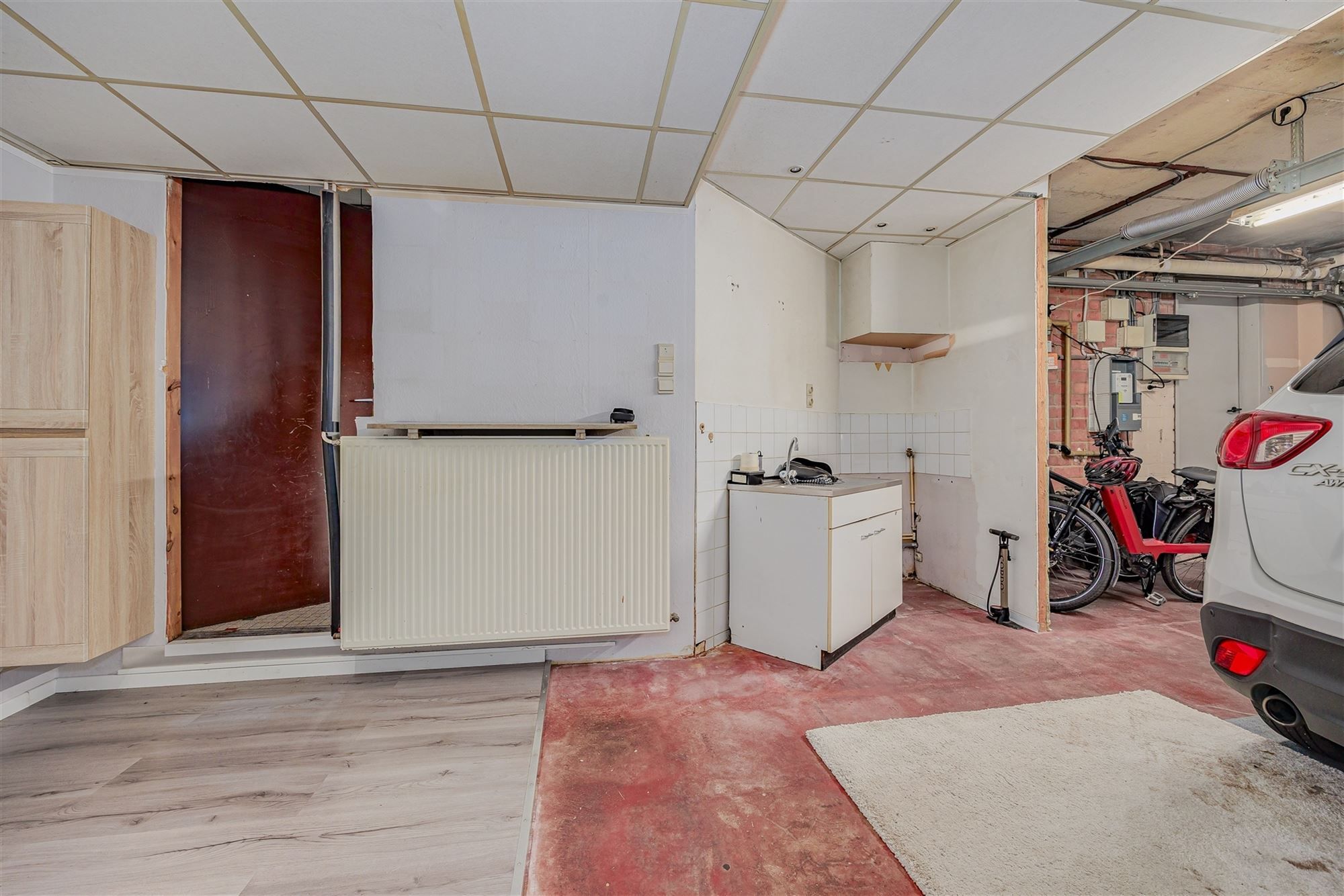 Uniek hoekperceel met handelshuis + garage + appt foto 12