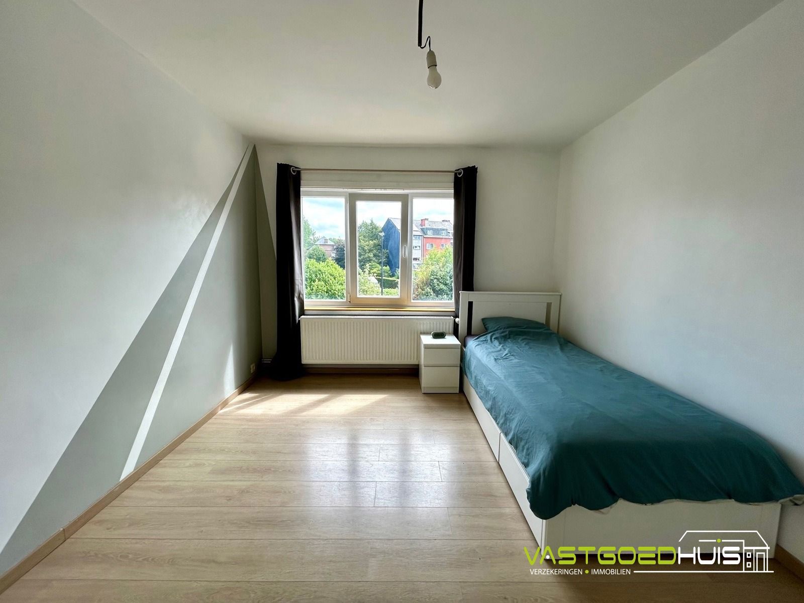 Ruime, instapklare gezinswoning met tuin foto 21