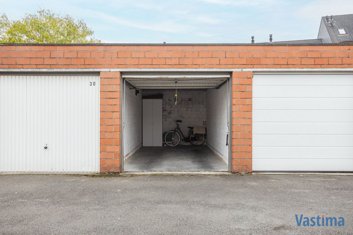 Instapklaar gelijkvloers appartement met tuin en garage foto 21