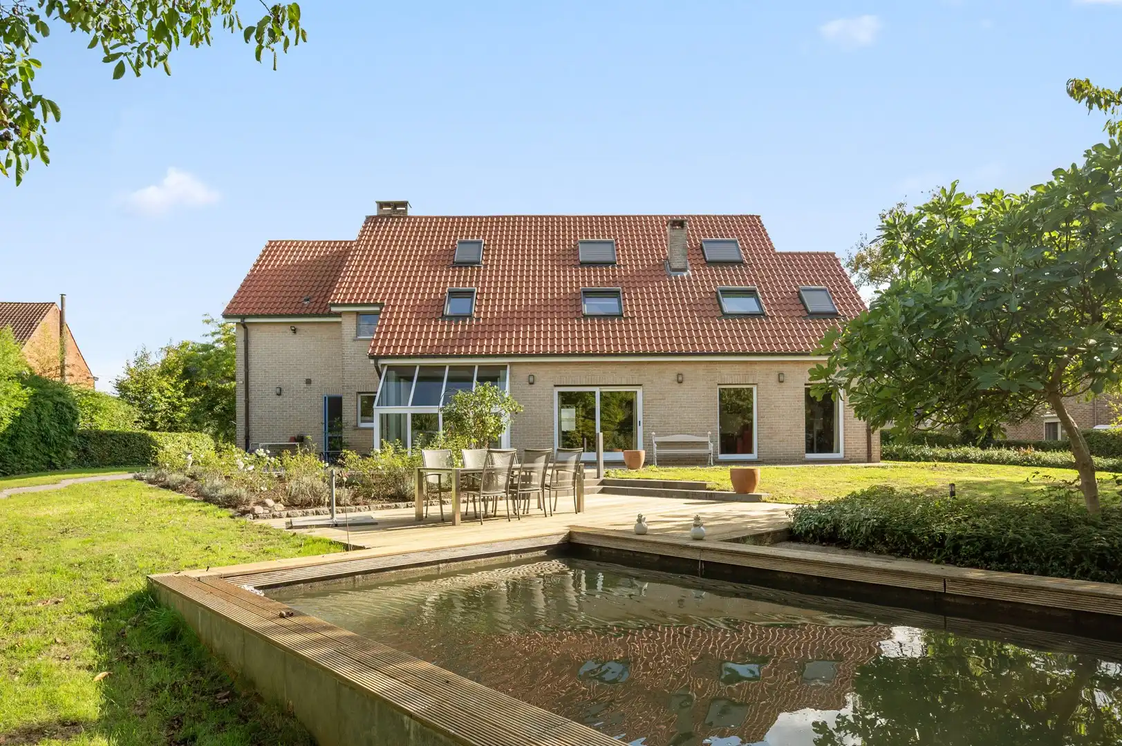 Ruime gezinswoning op een prachtig perceel van ruim 43 are met zwemvijver foto 24