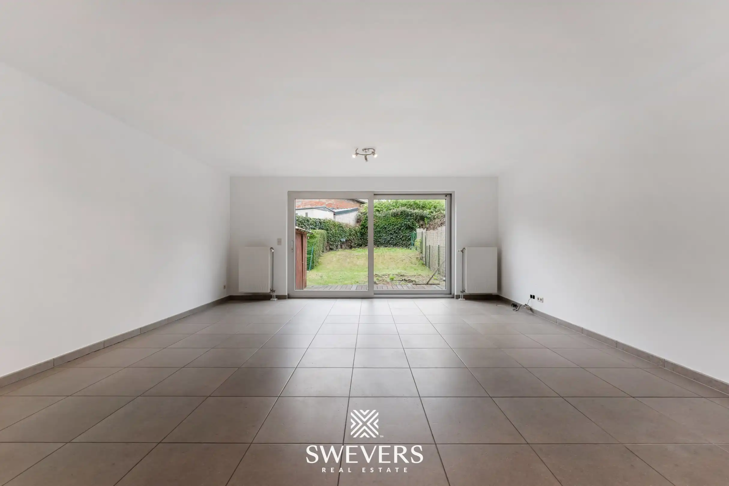 Ruim duplex appartement met 2 slaapkamers en tuin foto 5