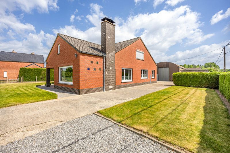 Ruime woning met loods op een perceel van 14are foto 33