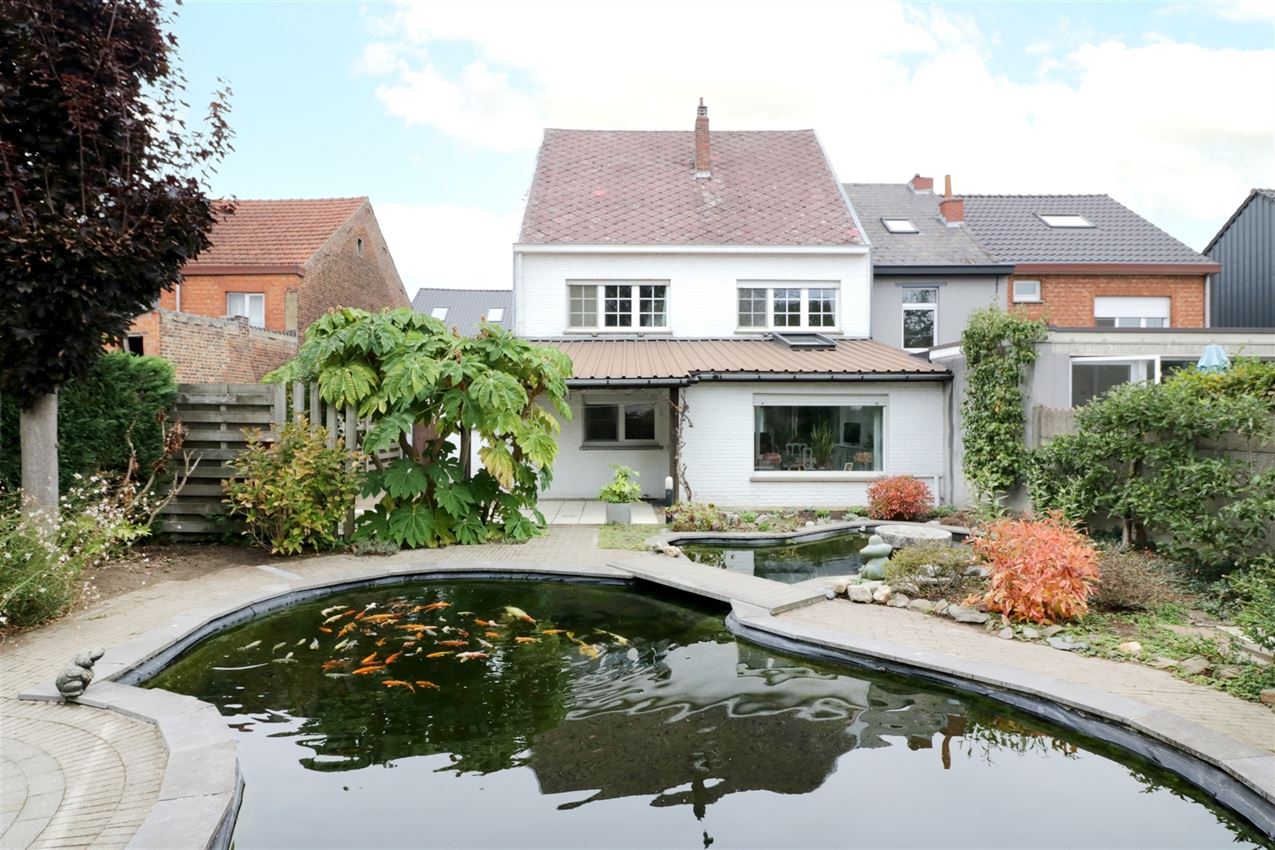 label c, nabij station, garage voor vijf wagens foto 38