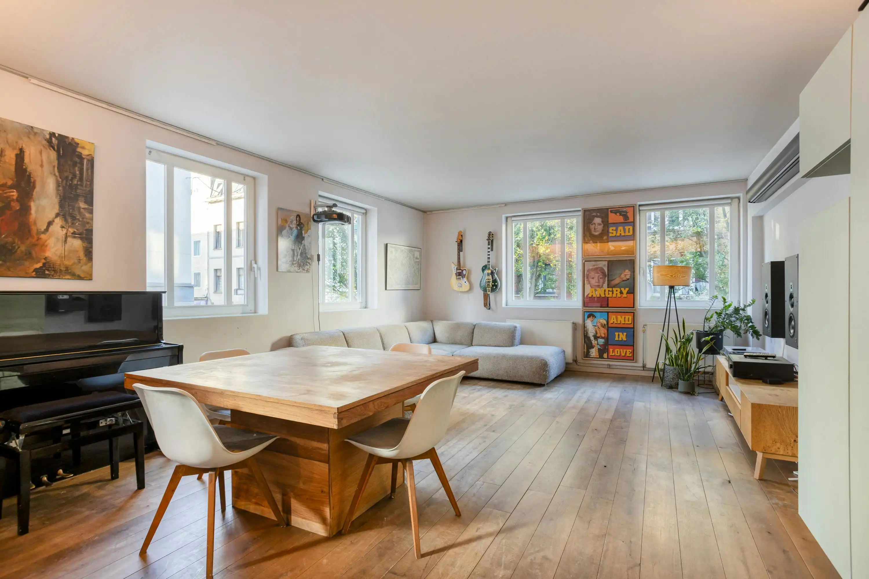 Lichtrijke design loft met stadsterras op 1 min van Dansaert foto {{pictureIndex}}
