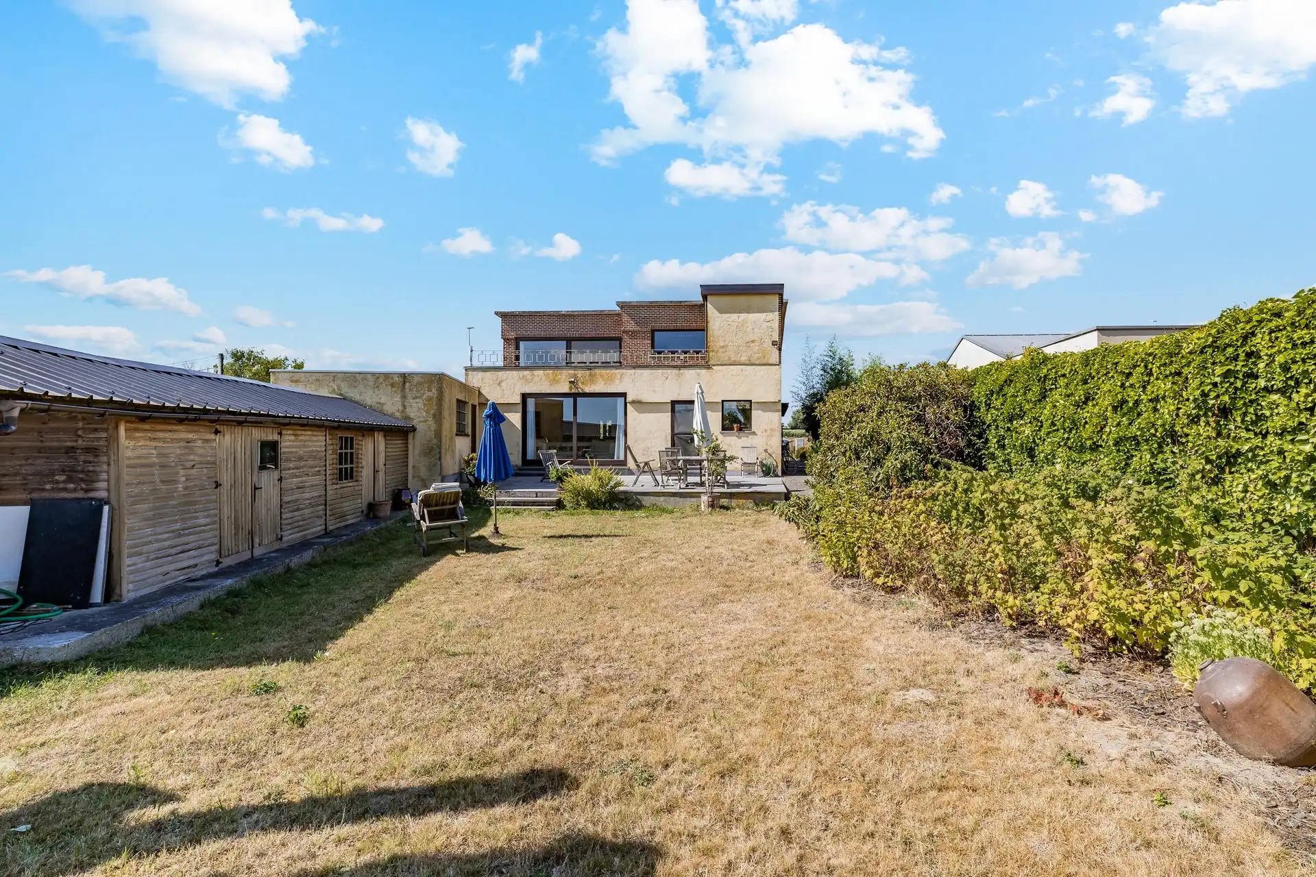 Zeer ruime woning met twee wooneenheden en prachtig landelijk uitzicht foto 29