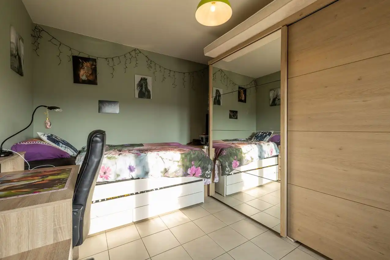 Gelijkvloerse woning EPC B met inpandige garage en gezellige tuin foto 4