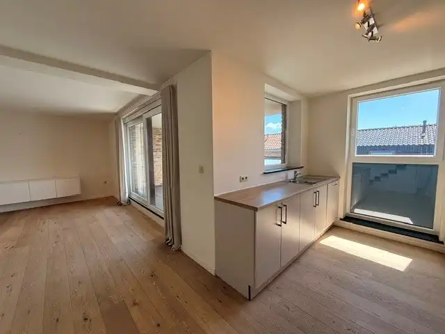 Luxe duplexappartement te huur in het hart van Maaseik, met lift, 2 slaapkamers en 2 terrassen.  foto 9