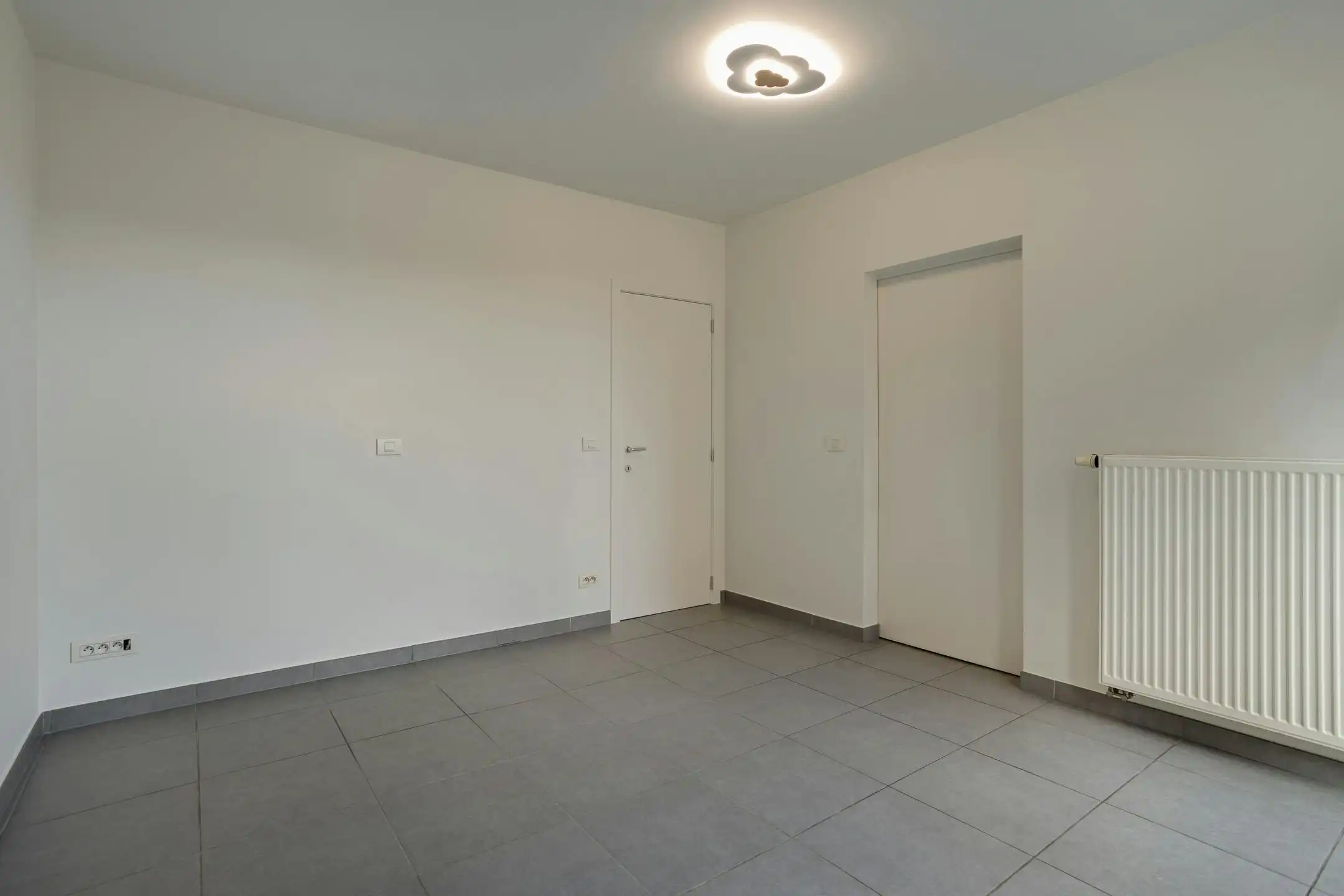 Gerenoveerd 1-slaapkamer appartement te koop in centrum Kortrijk foto 8