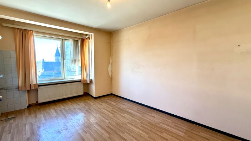 Gezellig en verrassend ruim appartement met 2 slaapkamers en veel potentieel in het hart van Deinze foto 7