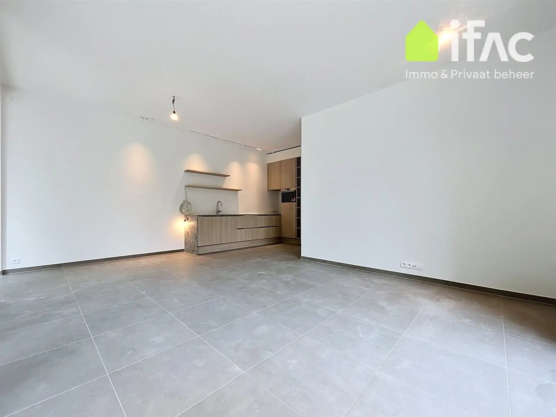 Uitstekend gelegen nieuwbouwappartement met autostaanplaats foto 2