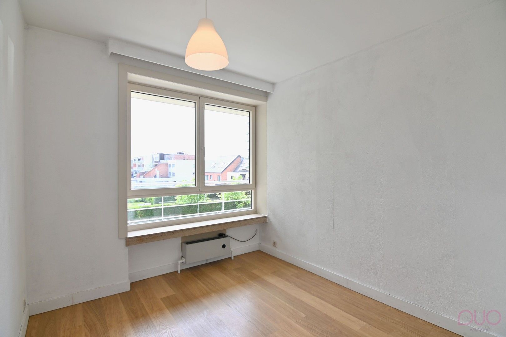 Lichtrijk appartement met drie slaapkamers, ondergrondse staanplaats en terras van 13m² foto 12