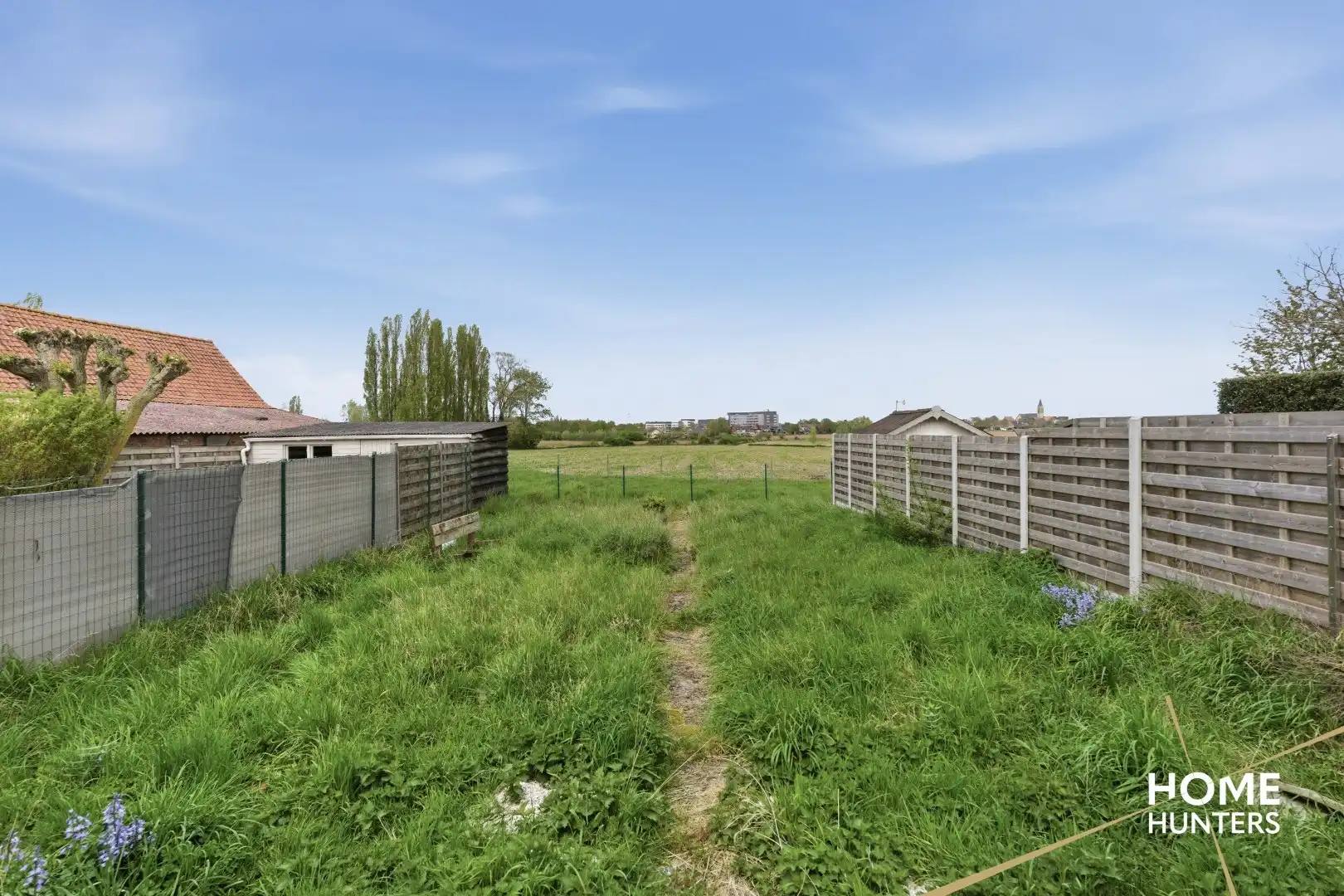 Halfopen te renoveren woning met 4 slaapkamers, ruime tuin en garage op gunstige locatie te Ieper foto 24