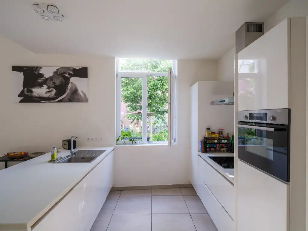 Hoekwoning met aangenaam volumespel, 3 slaapkamers, aparte fietsenberging en twee zongerichte terrassen, gelegen in de omgeving van Portus Ganda. foto 9