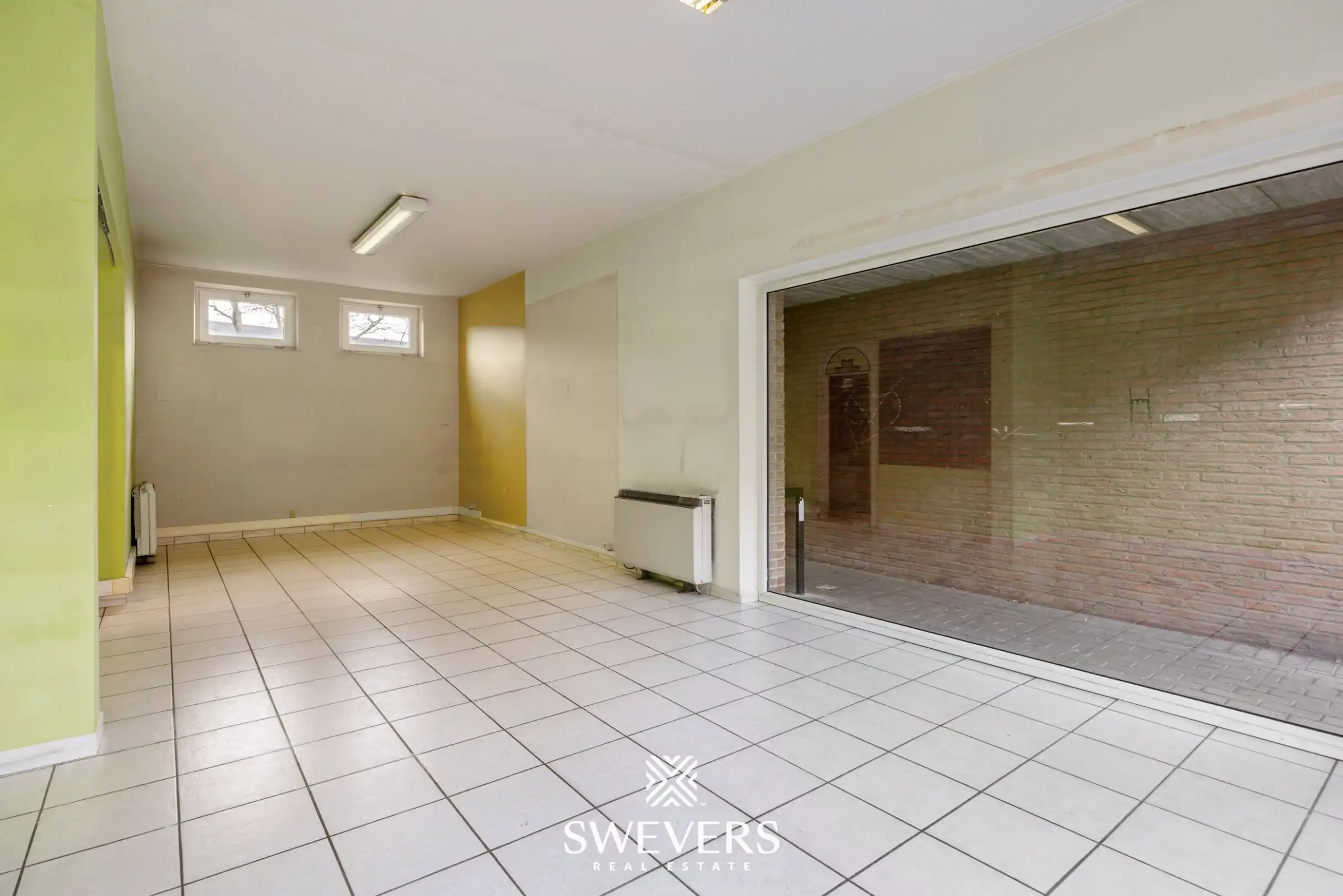 Commercieel pand met garage in centrum Beringen foto 15