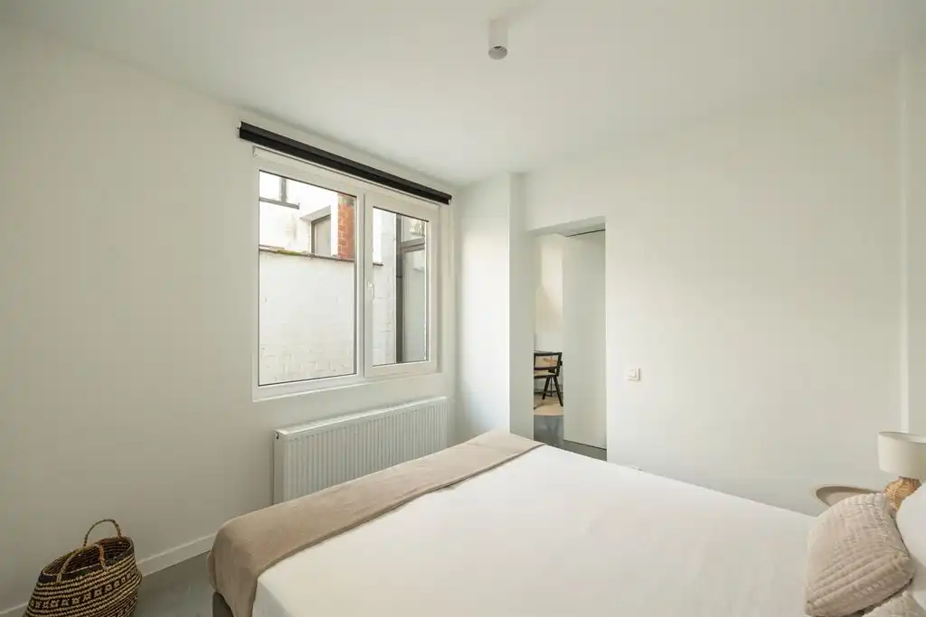 Gerenoveerd gelijkvloers appartement met stadstuin foto 11