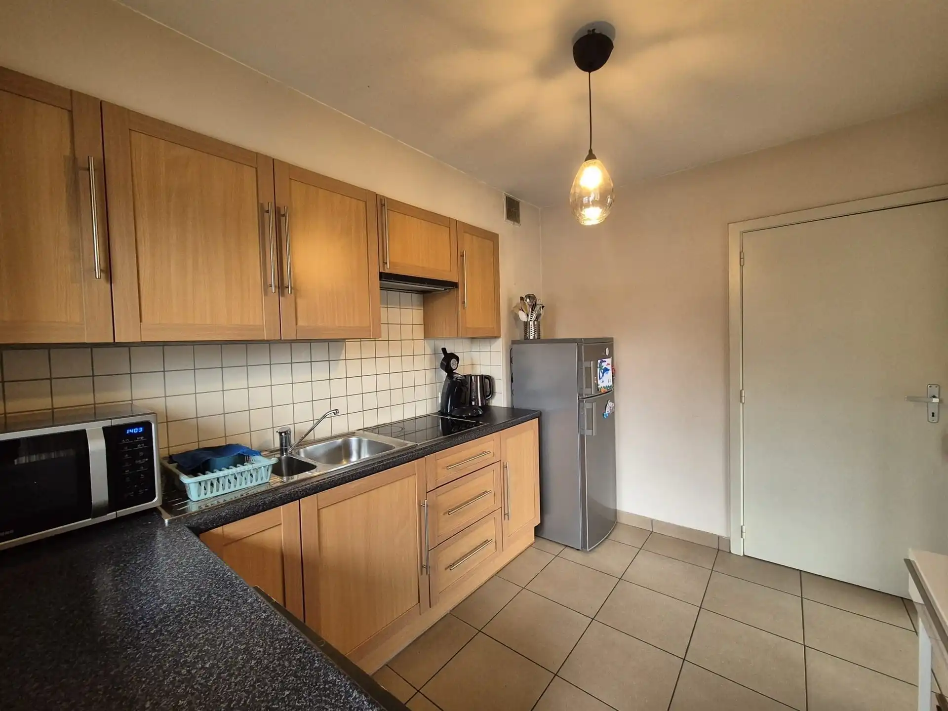 Interessant gelegen appartement met terras en garage. foto 12