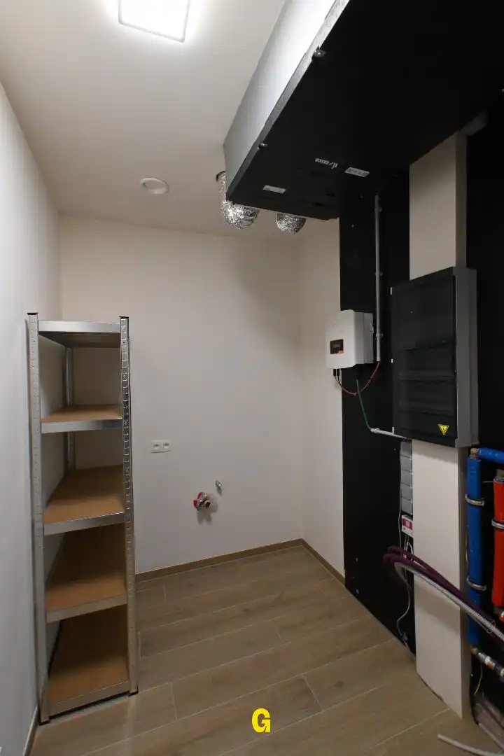 Nieuwbouwappartement met 2 slaapkamers, ruim terras, standplaats en berging te Munsterbilzen - Label A foto 31