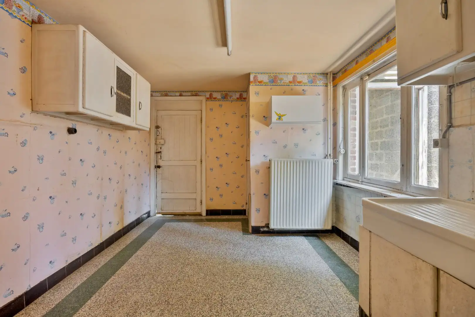 Ruime te renoveren woning met 3 slaapkamers in Lubbeek met doorgang langs het perceel van de buren. EPC: 736 KWH/m² foto 13