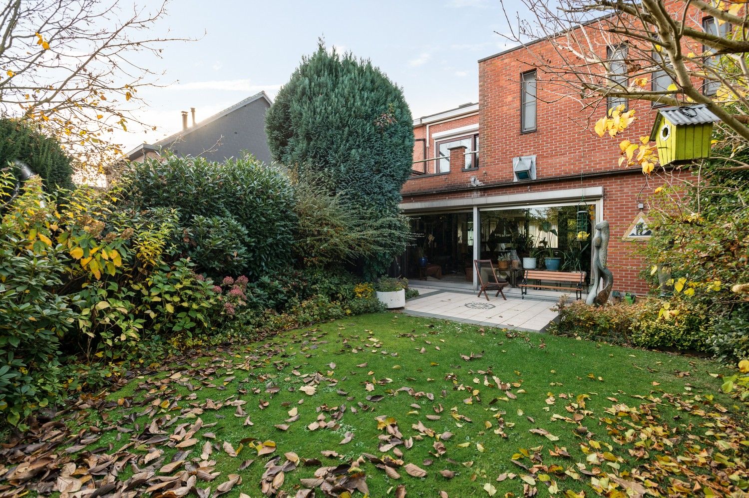 Karaktervolle halfopen woning met garage, oprit en gezellige tuin nabij het centrum van Borsbeek! foto 25