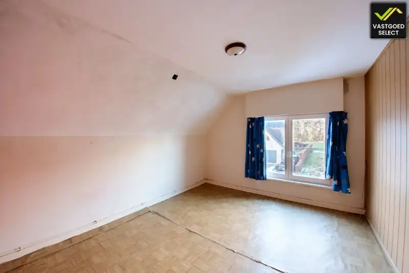 Te renoveren woning met tuin en garage in Sint-Laureins foto 10