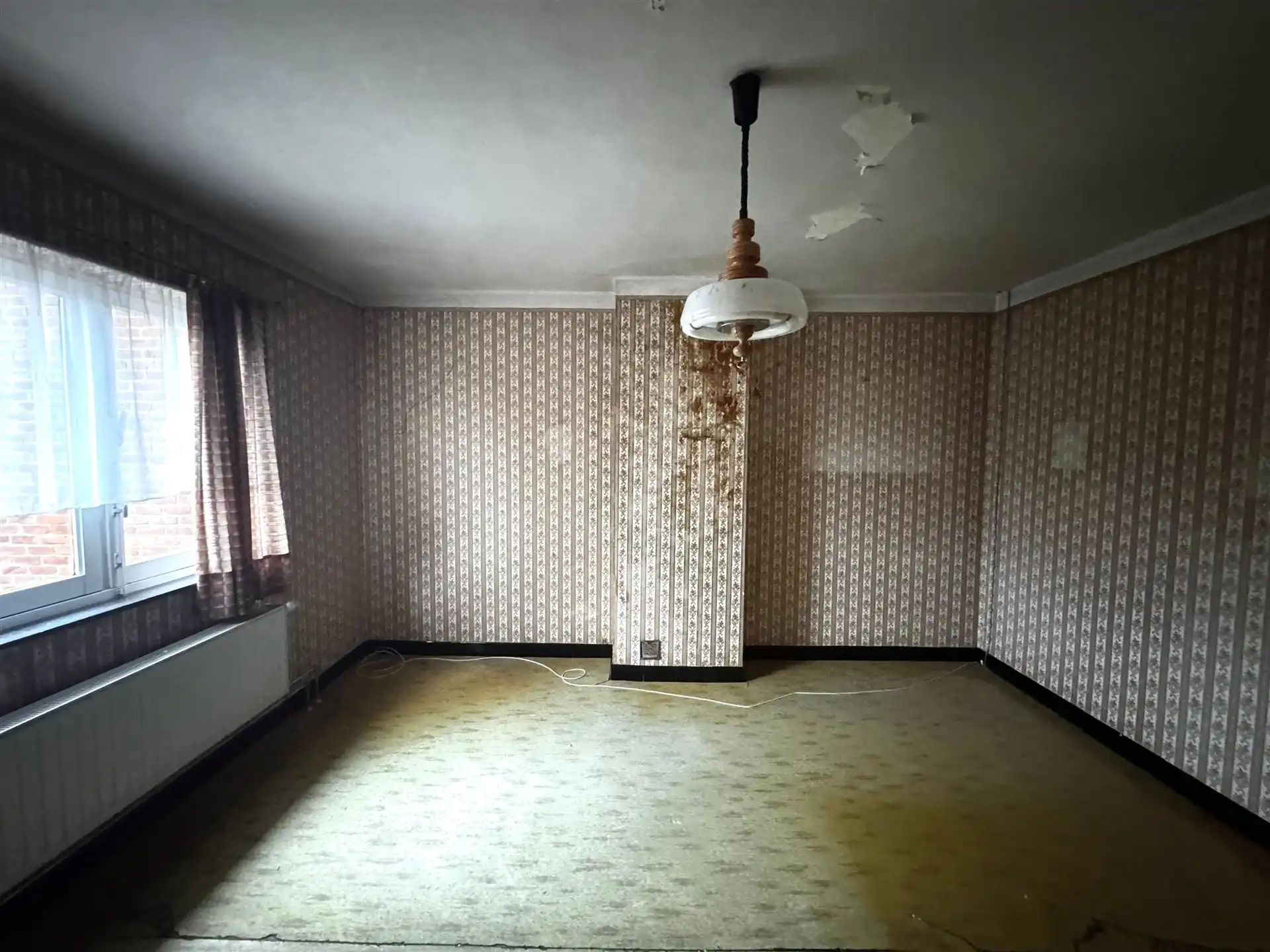 Halfopen te verbouwen woning op rustige locatie in Maasmechelen foto 11