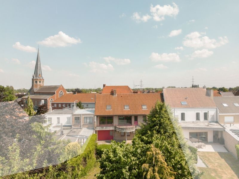 Centraal gelegen gebouw met gelijkvloerse handelsruimte, appartement met terras, extra verdieping en grote tuin foto 10